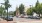 a street with cars parked on the side