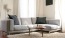 oversized windows brighten spacious, furnished living room