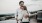 a man and woman hugging on rooftop terrace