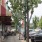 a sidewalk with cars parked on it
