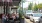 a group of people sitting at a table outside