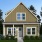 a house with trees and grass
