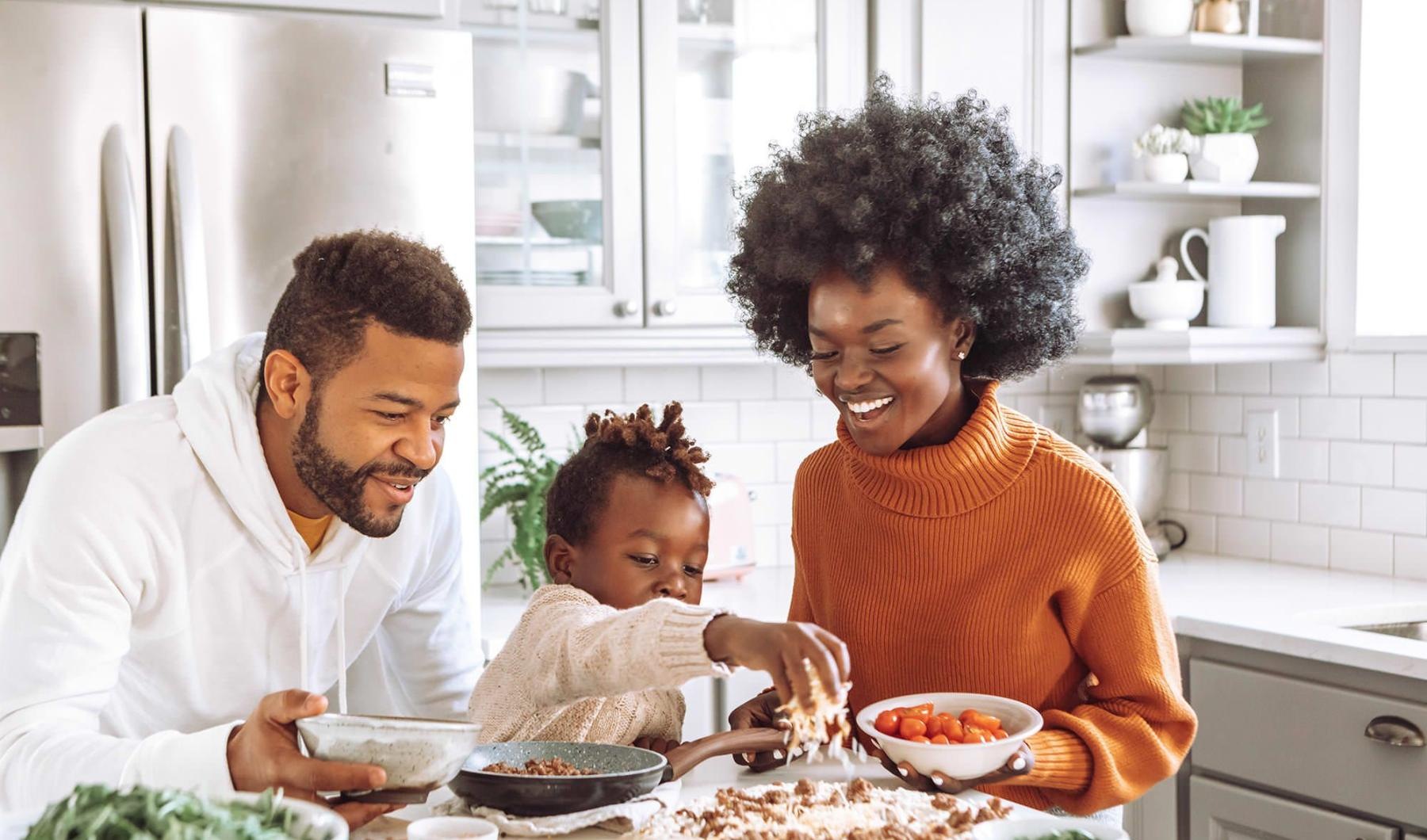a family cooking together